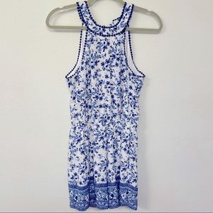 Francesca’s | Blue and White Floral Romper with Back Tie